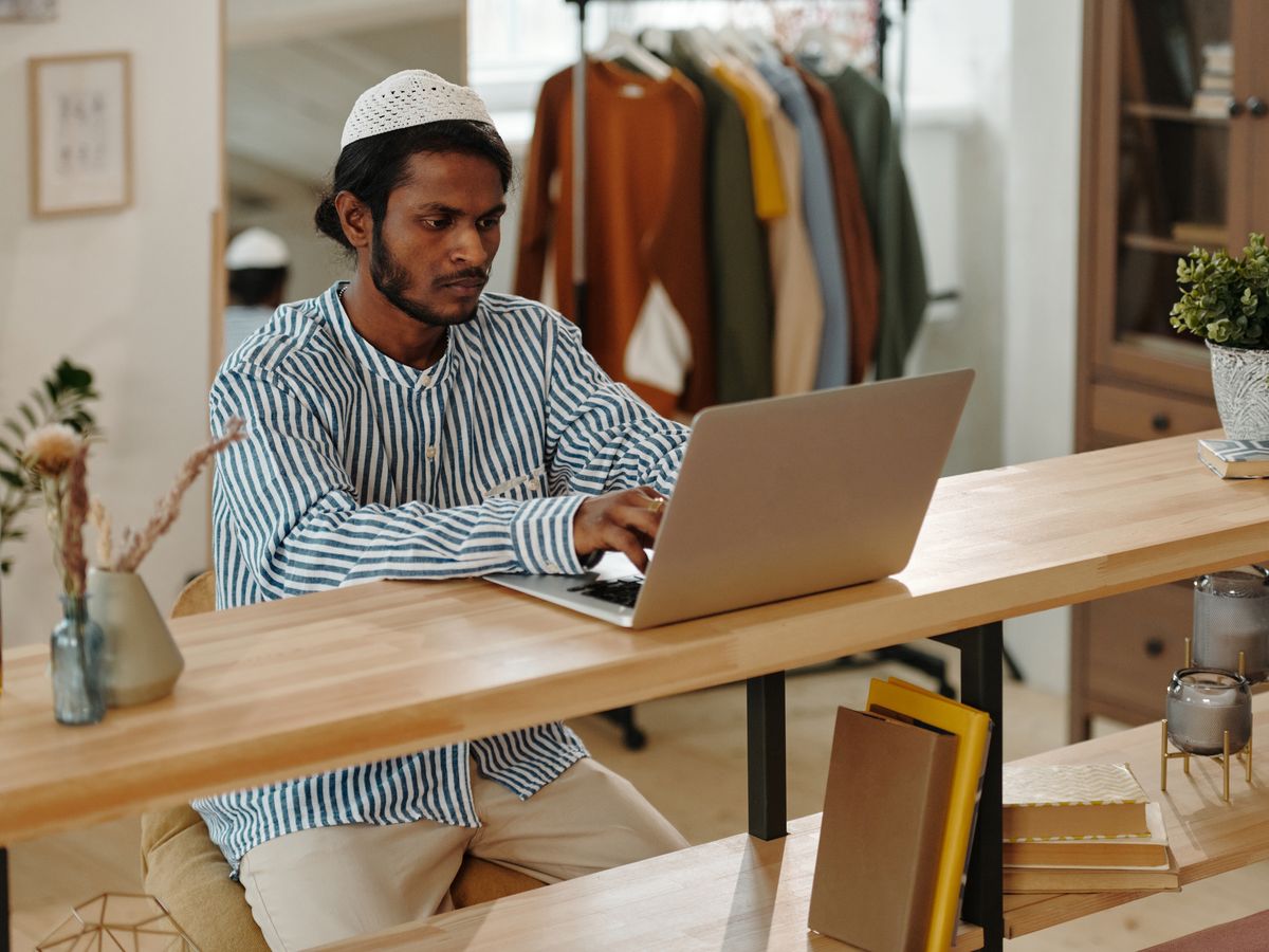 A man working at a laptop computer